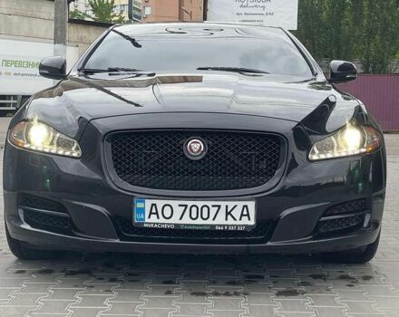 Черный Ягуар Икс Джей, объемом двигателя 3 л и пробегом 125 тыс. км за 23100 $, фото 1 на Automoto.ua