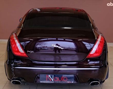 Красный Ягуар Икс Джей, объемом двигателя 5 л и пробегом 133 тыс. км за 13900 $, фото 5 на Automoto.ua