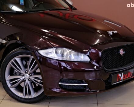 Красный Ягуар Икс Джей, объемом двигателя 5 л и пробегом 133 тыс. км за 13900 $, фото 2 на Automoto.ua