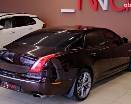 Красный Ягуар Икс Джей, объемом двигателя 5 л и пробегом 133 тыс. км за 13900 $, фото 4 на Automoto.ua