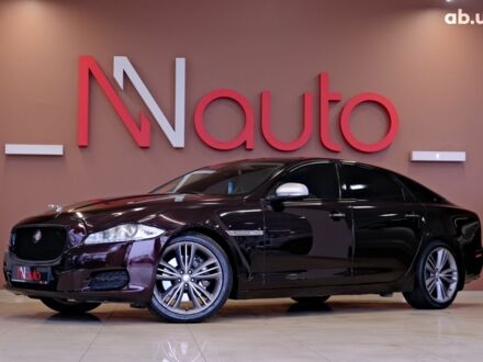 Красный Ягуар Икс Джей, объемом двигателя 5 л и пробегом 133 тыс. км за 13900 $, фото 1 на Automoto.ua