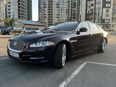 Червоний Ягуар Ікс Джей, об'ємом двигуна 2.97 л та пробігом 124 тис. км за 19990 $, фото 1 на Automoto.ua