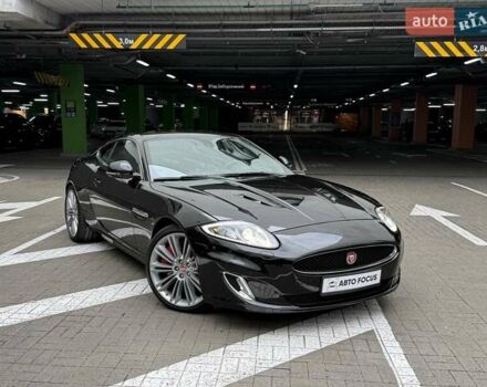 Черный Ягуар ХК, объемом двигателя 5 л и пробегом 65 тыс. км за 27990 $, фото 1 на Automoto.ua