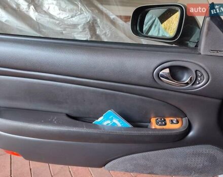 Синий Ягуар ХК, объемом двигателя 4 л и пробегом 999 тыс. км за 20960 $, фото 6 на Automoto.ua