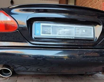 Синий Ягуар ХК, объемом двигателя 4 л и пробегом 999 тыс. км за 20960 $, фото 2 на Automoto.ua