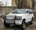 Білий Джип Cherokee, об'ємом двигуна 5.2 л та пробігом 250 тис. км за 5000 $, фото 1 на Automoto.ua