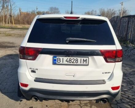 Белый Джип Чероки, объемом двигателя 3 л и пробегом 255 тыс. км за 16500 $, фото 1 на Automoto.ua