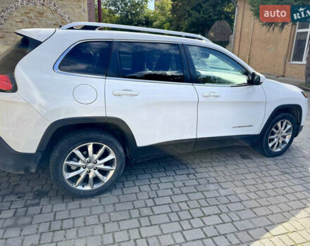 Белый Джип Чероки, объемом двигателя 2.36 л и пробегом 220 тыс. км за 12000 $, фото 2 на Automoto.ua
