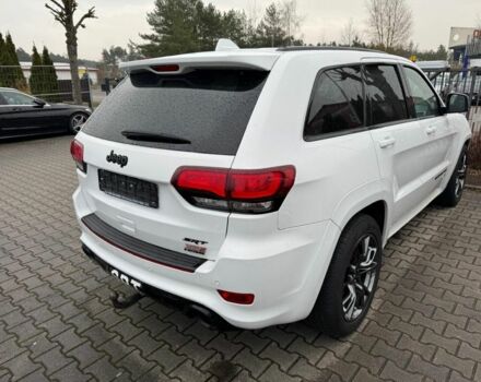 Белый Джип Чероки, объемом двигателя 6.4 л и пробегом 145 тыс. км за 30145 $, фото 1 на Automoto.ua