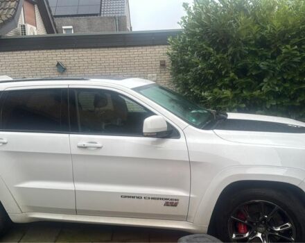 Белый Джип Чероки, объемом двигателя 6.4 л и пробегом 145 тыс. км за 30145 $, фото 2 на Automoto.ua