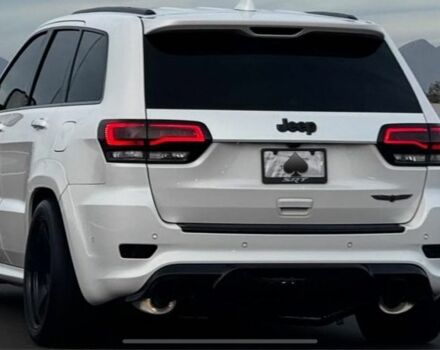 Белый Джип Чероки, объемом двигателя 6.4 л и пробегом 145 тыс. км за 30145 $, фото 3 на Automoto.ua