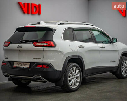 Білий Джип Cherokee, об'ємом двигуна 2 л та пробігом 164 тис. км за 19860 $, фото 1 на Automoto.ua