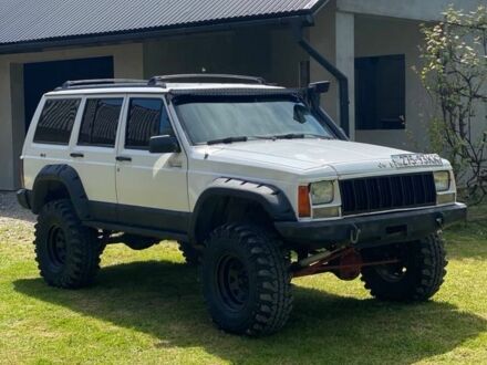 Білий Джип Cherokee, об'ємом двигуна 4 л та пробігом 300 тис. км за 8000 $, фото 1 на Automoto.ua