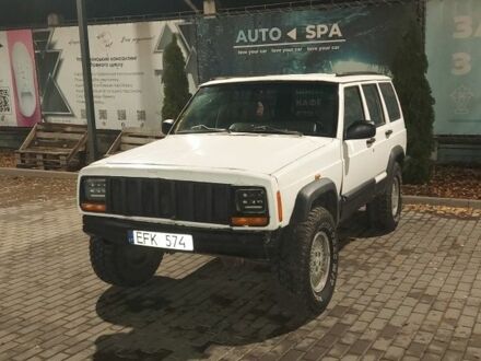 Белый Джип Чероки, объемом двигателя 2.5 л и пробегом 250 тыс. км за 2400 $, фото 1 на Automoto.ua