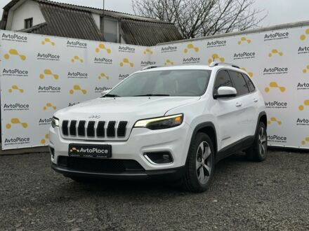 Білий Джип Cherokee, об'ємом двигуна 24 л та пробігом 220 тис. км за 15700 $, фото 1 на Automoto.ua
