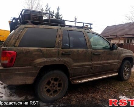 Бежевий Джип Cherokee, об'ємом двигуна 4 л та пробігом 300 тис. км за 7500 $, фото 2 на Automoto.ua