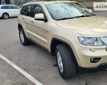 Бежевий Джип Cherokee, об'ємом двигуна 3 л та пробігом 165 тис. км за 19500 $, фото 3 на Automoto.ua