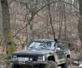 Черный Джип Чероки, объемом двигателя 4 л и пробегом 225 тыс. км за 7506 $, фото 1 на Automoto.ua