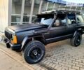 Чорний Джип Cherokee, об'ємом двигуна 4 л та пробігом 209 тис. км за 8000 $, фото 4 на Automoto.ua