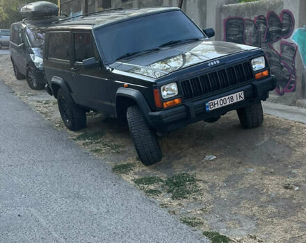 Черный Джип Чероки, объемом двигателя 2.1 л и пробегом 100 тыс. км за 12000 $, фото 1 на Automoto.ua