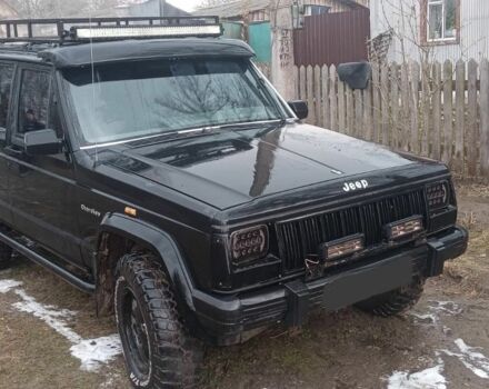 Черный Джип Чероки, объемом двигателя 4 л и пробегом 235 тыс. км за 2200 $, фото 1 на Automoto.ua