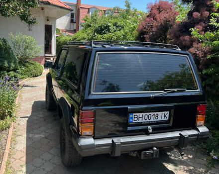 Черный Джип Чероки, объемом двигателя 2.1 л и пробегом 100 тыс. км за 12000 $, фото 9 на Automoto.ua