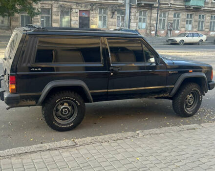 Черный Джип Чероки, объемом двигателя 2.1 л и пробегом 100 тыс. км за 12000 $, фото 5 на Automoto.ua