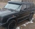 Черный Джип Чероки, объемом двигателя 4 л и пробегом 235 тыс. км за 2200 $, фото 2 на Automoto.ua