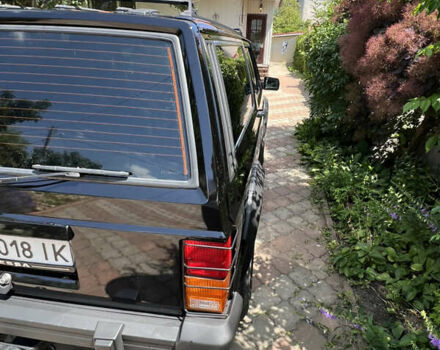 Черный Джип Чероки, объемом двигателя 2.1 л и пробегом 100 тыс. км за 12000 $, фото 10 на Automoto.ua