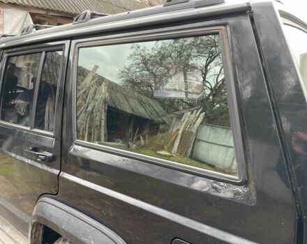 Чорний Джип Cherokee, об'ємом двигуна 4 л та пробігом 350 тис. км за 3800 $, фото 5 на Automoto.ua
