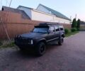 Чорний Джип Cherokee, об'ємом двигуна 4 л та пробігом 316 тис. км за 6500 $, фото 1 на Automoto.ua