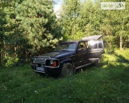 Чорний Джип Cherokee, об'ємом двигуна 4 л та пробігом 322 тис. км за 5800 $, фото 4 на Automoto.ua