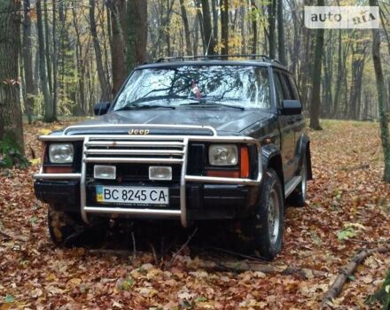 Чорний Джип Cherokee, об'ємом двигуна 4 л та пробігом 322 тис. км за 5800 $, фото 7 на Automoto.ua