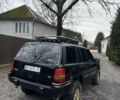 Чорний Джип Cherokee, об'ємом двигуна 5.2 л та пробігом 340 тис. км за 6300 $, фото 3 на Automoto.ua