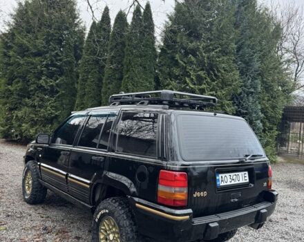 Чорний Джип Cherokee, об'ємом двигуна 5.2 л та пробігом 340 тис. км за 6300 $, фото 2 на Automoto.ua