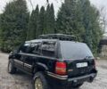 Чорний Джип Cherokee, об'ємом двигуна 5.2 л та пробігом 340 тис. км за 6300 $, фото 2 на Automoto.ua