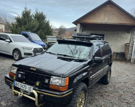 Чорний Джип Cherokee, об'ємом двигуна 5.2 л та пробігом 340 тис. км за 6300 $, фото 1 на Automoto.ua