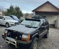 Чорний Джип Cherokee, об'ємом двигуна 5.2 л та пробігом 340 тис. км за 6300 $, фото 1 на Automoto.ua