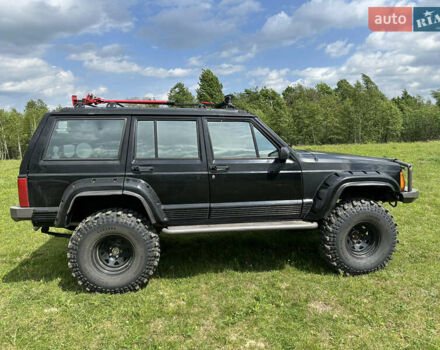 Черный Джип Чероки, объемом двигателя 4 л и пробегом 370 тыс. км за 11500 $, фото 5 на Automoto.ua