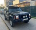 Черный Джип Чероки, объемом двигателя 2.5 л и пробегом 230 тыс. км за 6700 $, фото 1 на Automoto.ua