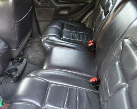 Черный Джип Чероки, объемом двигателя 4.7 л и пробегом 365 тыс. км за 6999 $, фото 6 на Automoto.ua