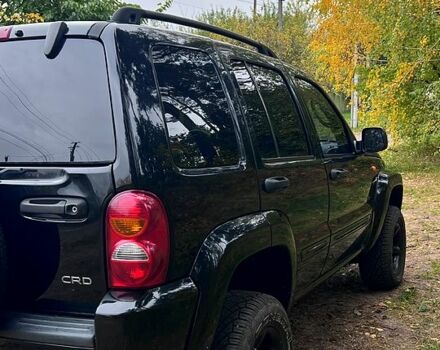 Чорний Джип Cherokee, об'ємом двигуна 2.5 л та пробігом 185 тис. км за 7500 $, фото 2 на Automoto.ua