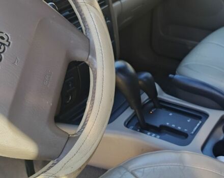 Черный Джип Чероки, объемом двигателя 2.7 л и пробегом 250 тыс. км за 7500 $, фото 7 на Automoto.ua