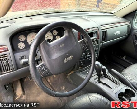 Чорний Джип Cherokee, об'ємом двигуна 2.7 л та пробігом 312 тис. км за 2200 $, фото 2 на Automoto.ua