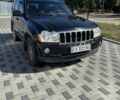 Черный Джип Чероки, объемом двигателя 3 л и пробегом 300 тыс. км за 8000 $, фото 1 на Automoto.ua