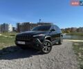 Черный Джип Чероки, объемом двигателя 3.2 л и пробегом 183 тыс. км за 13300 $, фото 1 на Automoto.ua