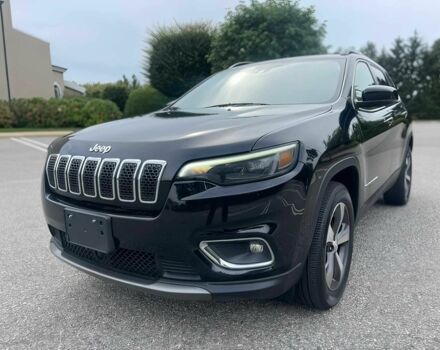 Черный Джип Чероки, объемом двигателя 2 л и пробегом 14 тыс. км за 12500 $, фото 2 на Automoto.ua