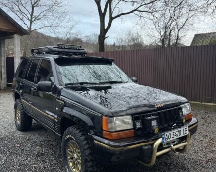 Чорний Джип Cherokee, об'ємом двигуна 5.2 л та пробігом 340 тис. км за 6300 $, фото 1 на Automoto.ua