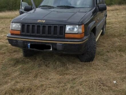 Чорний Джип Cherokee, об'ємом двигуна 5.2 л та пробігом 100 тис. км за 6326 $, фото 1 на Automoto.ua