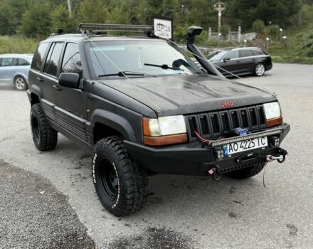 Чорний Джип Cherokee, об'ємом двигуна 5.2 л та пробігом 250 тис. км за 9500 $, фото 1 на Automoto.ua